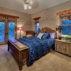 Cozy Master Bedroom in Rustic Arizona Estate Featuring Painted Brick Walls