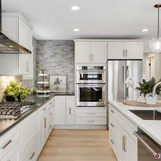 Open-Concept Kitchen With Gas Range and Double Oven