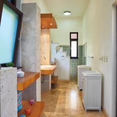 Bathroom With Cement Features Walls Showcases a Mosaic Tile Shower and Wood Vanity