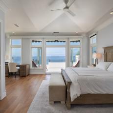 White Coastal Bedroom With Wood Bed