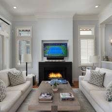 White Coastal Living Room With Gray Pillows