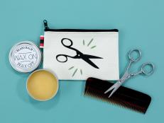 Stencil Pouch With Scissors Icon on Table With DIY Beard Balm in Tin