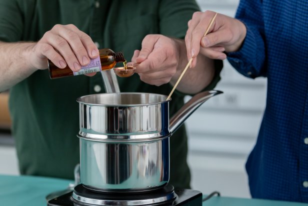 Place the double boiler over low/medium heat. Add all ingredients together except the essential oils. Stir continuously with a wooden skewer as the ingredients begin to melt together. Tip: Do not let the ingredients come to a boil.