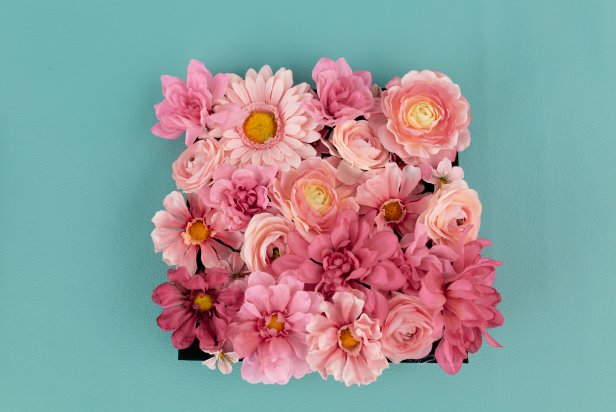 Graduation Cap Covered in Pink Faux Flowers