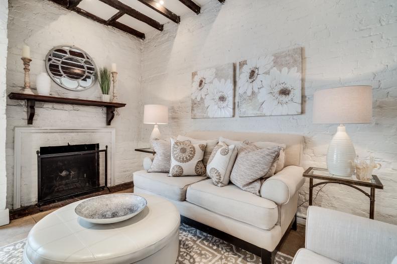 Transitional Living Room With Comfy Sofa, Fireplace, Exposed Beams