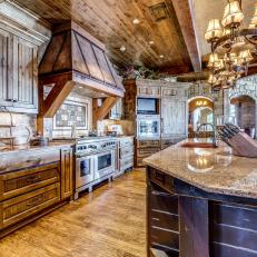 Rustic Chef Kitchen With Copper Hood