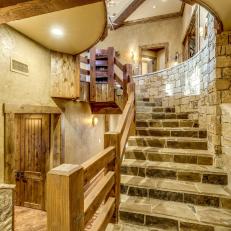 Rustic Stone Stairway With Wood Railing