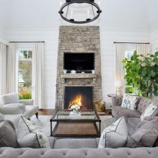 White Transitional Living Room With Stone Fireplace