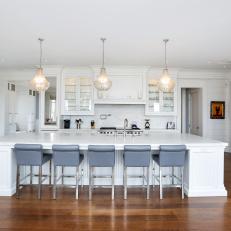 White Transitional Chef Kitchen With Gray Barstools
