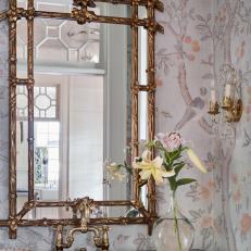 Traditional Powder Room With Vintage Mirror