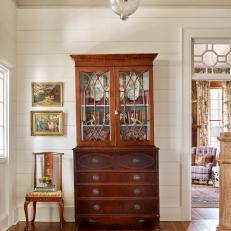 Antique Curio Cabinet with Porcelain and Books