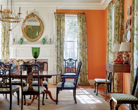 A traditional dining room features an antique dining set.