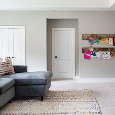 Gray Transitional Living Room With Kid Art