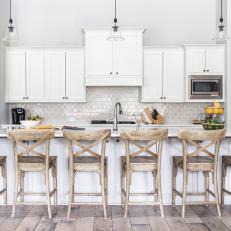 White Eat In Kitchen With Rustic Barstools