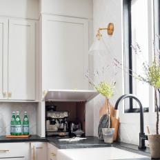 Gray and White Chef Kitchen With Coffee Maker