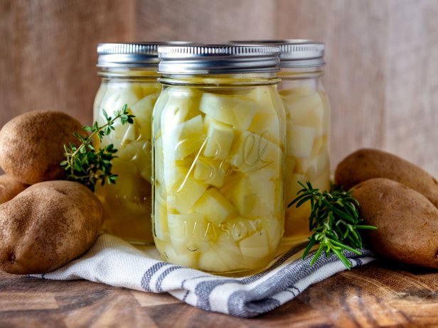 Canned Potatoes on a table.