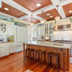 Heart Pine Floor and Island in an Updated Kitchen