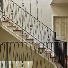 Custom Iron Staircase With Hanging Lights