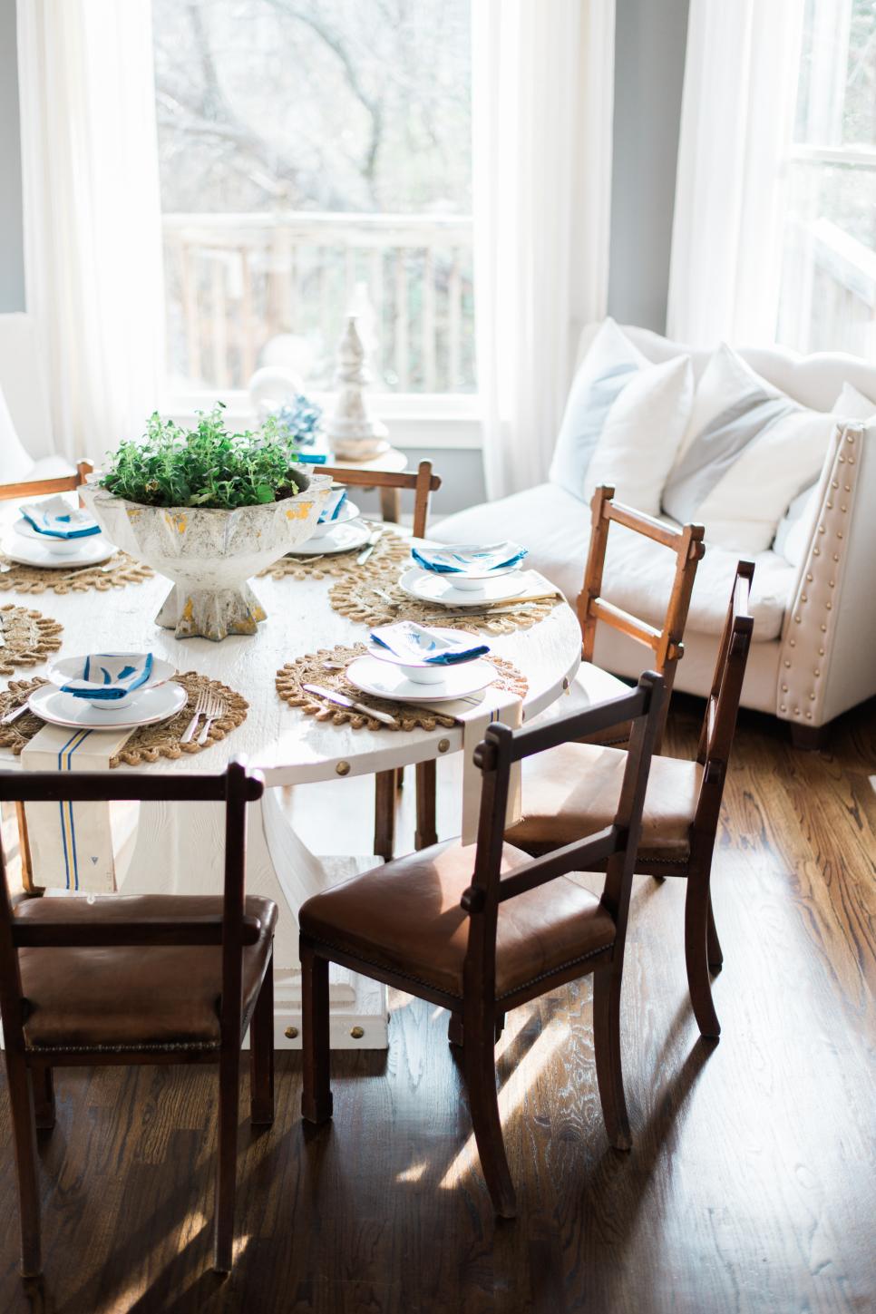 Breakfast Nook with White Seating and Pedestal Table | HGTV