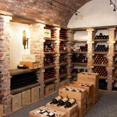 A New Basement Wine Cellar With Exposed Brick