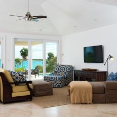 Tropical Living Room With Brown Sectional