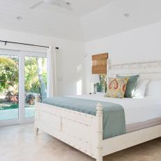 Tropical Bedroom With White Wood Bed