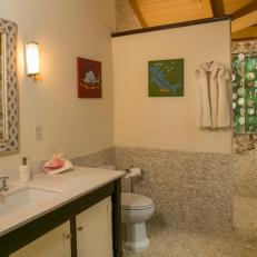 Tropical Bathroom With Pebbled Floor