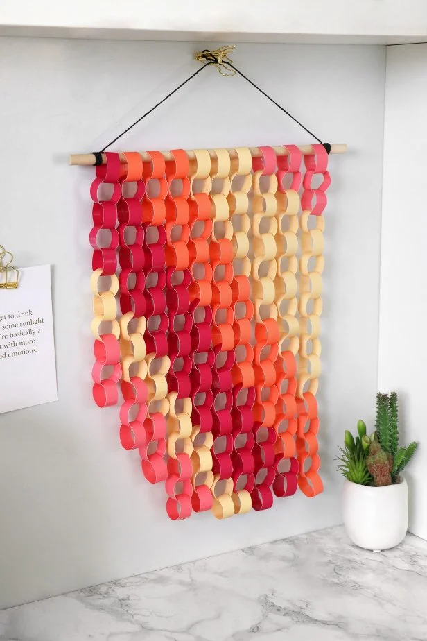 Hang up your paper chain wall art, turning all of the circles so the tape is in the back.