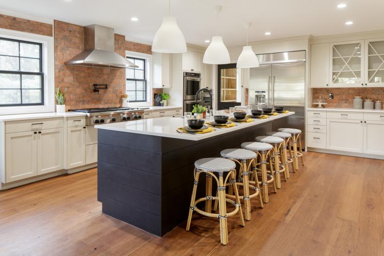 Bold Black Island With Bamboo Stools Makes a Statement in Kitchen