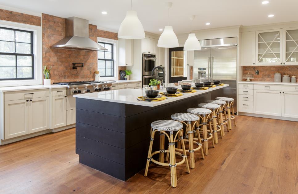 Bold Black Island With Bamboo Stools Makes a Statement in Classy Kitchen