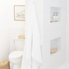 White Bathroom With Hanging Towel