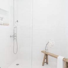 White Walk-In Shower With Orchid