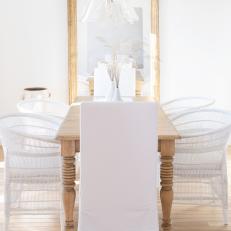 Scandinavian Dining Room With Gold Frame