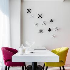 Modern Dining Room With Multicolored Chairs