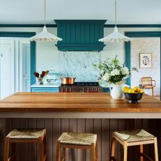 Blue Cottage Kitchen With White Pendants