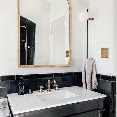 Black and White Bathroom With Gold Mirror