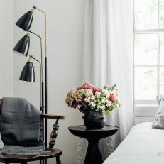 Eclectic Bedroom With Black Floor Lamp