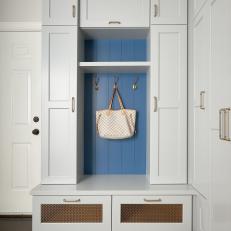 White Mudroom With Blue Paneling