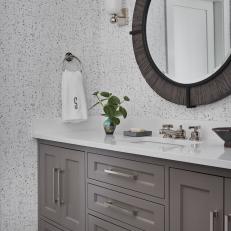 Bathroom With Gray Wallpaper and Floor Tiles