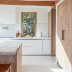 Midcentury Modern Kitchen With White Floor