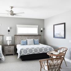 Gray Coastal Bedroom With Striped Pillow