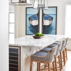 Kitchen Island With Gray Woven Barstools