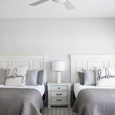 Gray Coastal Bedroom With Polka Dot Lamp