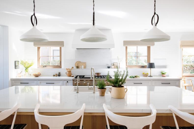 White Chef's Kitchen With Soft Wood Accents