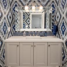 Blue Powder Room With Geometric Wallpaper