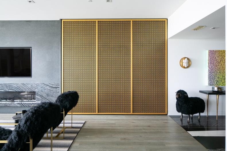Custom Brass Accent Wall Is Featured in an Open Concept Living Area 