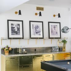 Hammered Brass Cabinets Topped With Marble Countertops Create the Perfect Bar