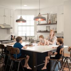 White Transitional Chef Kitchen With Family