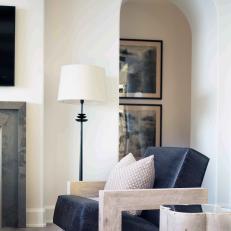 Black Armchair and Arched Doorway
