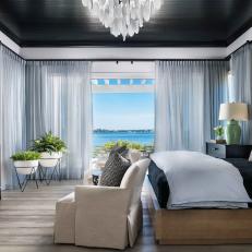 Waterfront Bedroom With Black Ceiling